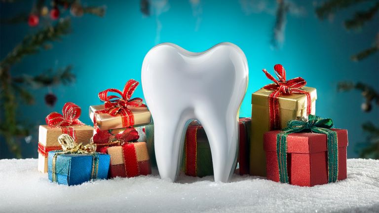 An AI image of a tooth next to wrapped holiday gifts.